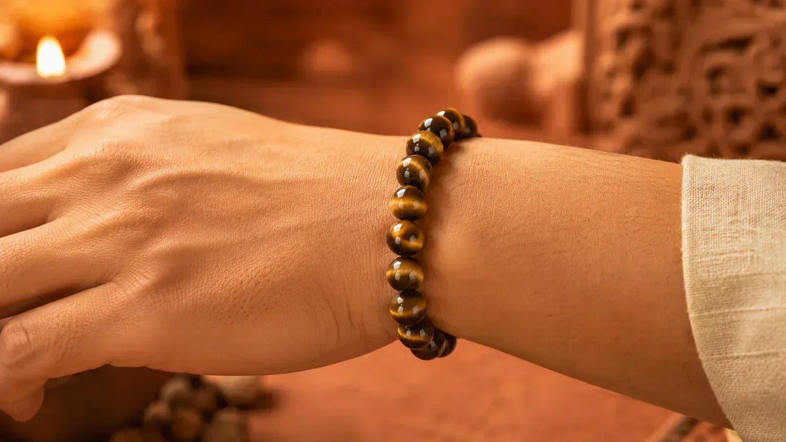 Tiger eye bracelet benefits - golden brown natural stone bracelet on wrist